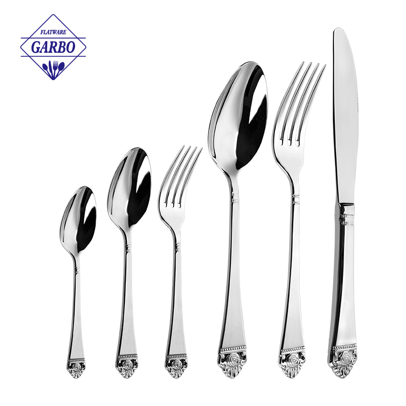 Elegant embossed handle silvery flatware set