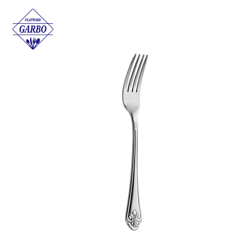 Classic stainless steel fork for dinner with engraved handle